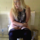 A plump, blonde girl sits down on a toilet. A huge explosion and a few wet, followup plops/drips are heard as she takes a shit. She wipes her ass and cleans the toilet bowl when finished. Presented in 720P HD. Exactly 3 minutes.
